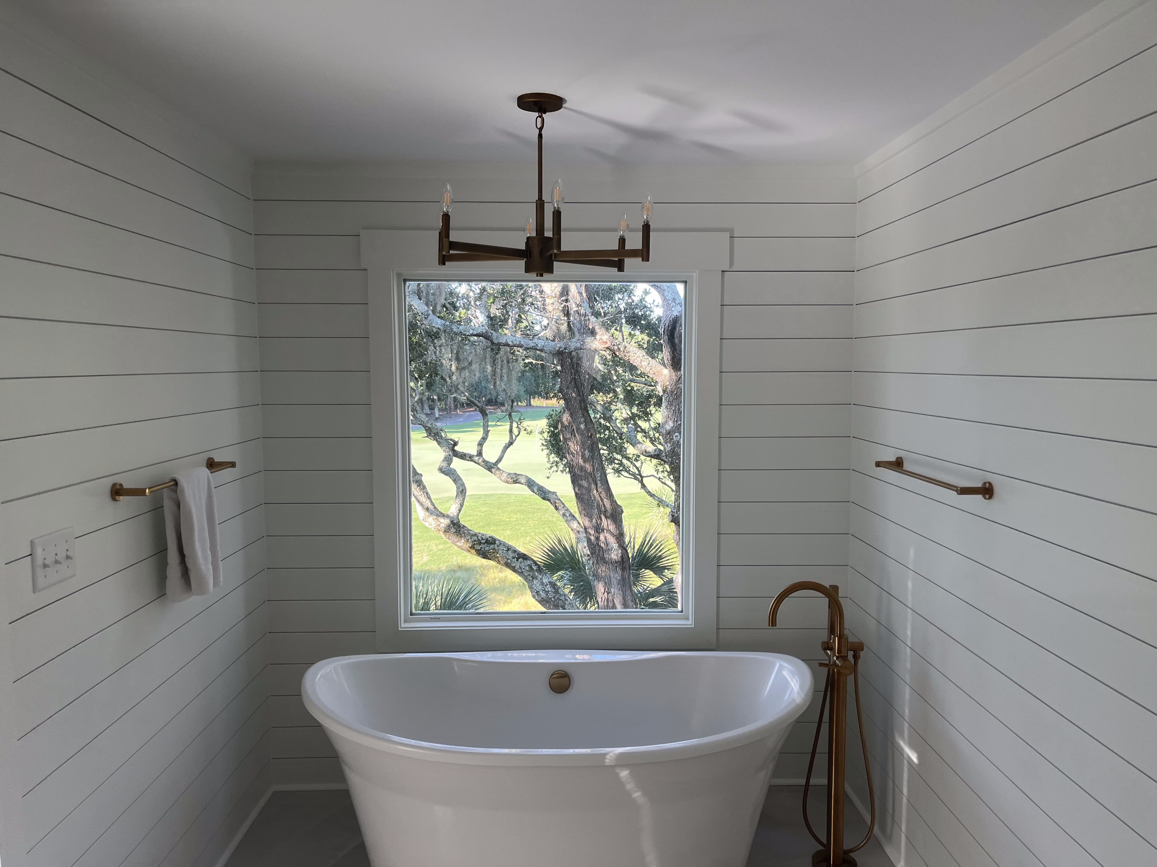 Freestanding tub remodel with Bald Head Island views by Project Works